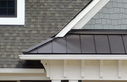 Mold growth in an attic due to poor roof ventilation.