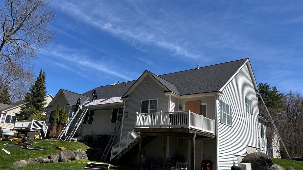 Completed roofing project by Compass Exteriors in Stratham, NH