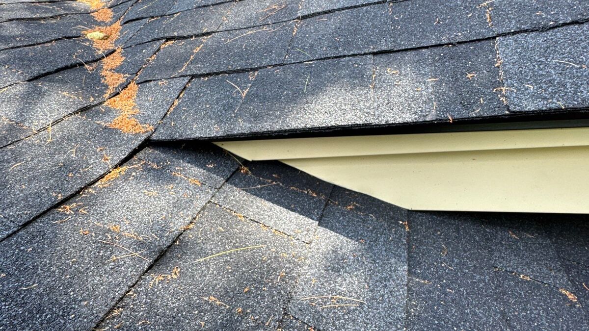Completed roofing project by Compass Exteriors in Stratham, NH