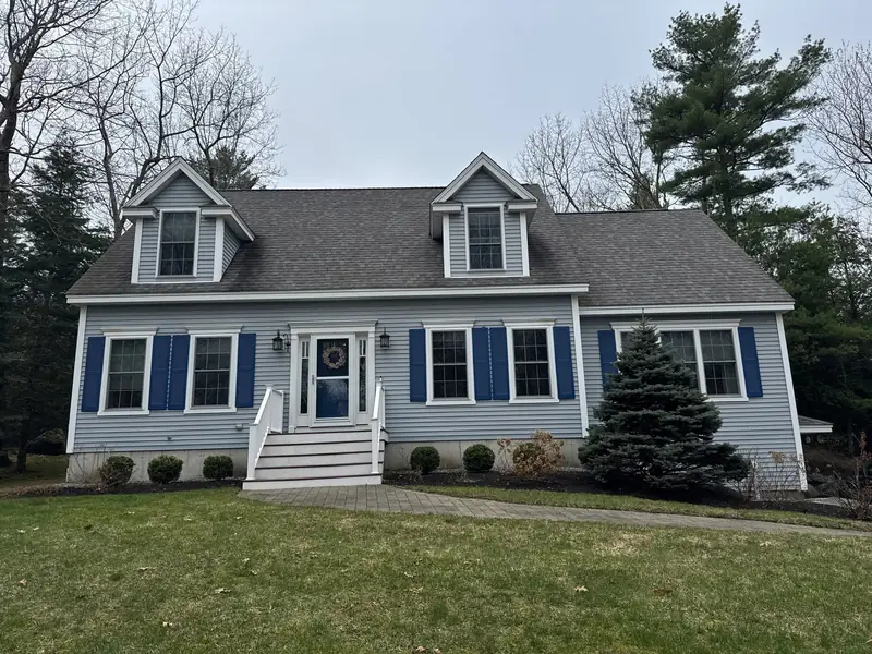 Cape Roof Replacement With Rot Repair and Exhaust Reroute in Exeter, NH — completed by Compass Exteriors in Exeter