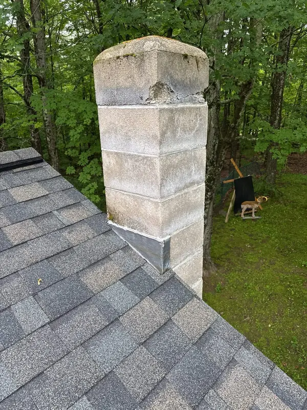 Peppercorn Shingles Replace Storm-Worn Roof — Concord, NH — completed by Compass Exteriors in Concord