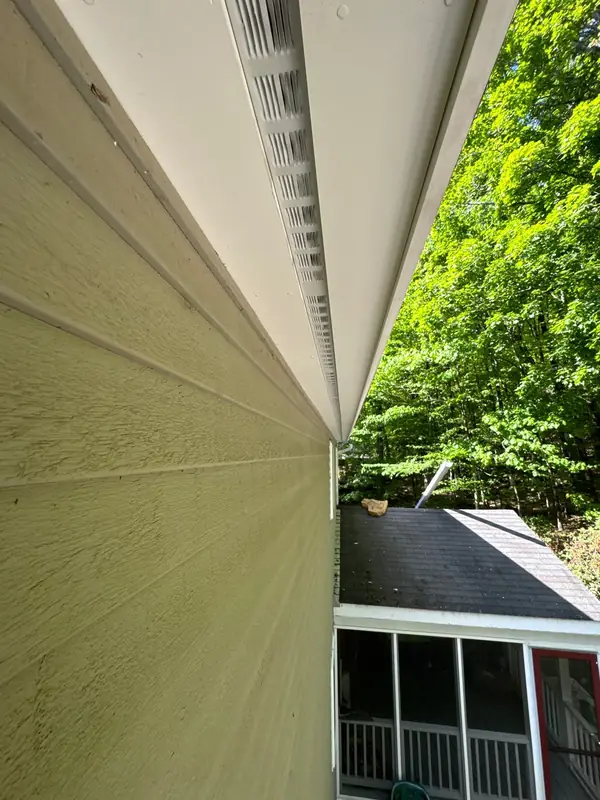 Light Grey Vinyl Siding with AZEK PVC Trim — Weare, NH — completed by Compass Exteriors in Weare