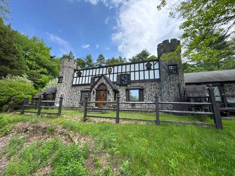 Custom EPDM Wrapped Around Two Stone Turrets — Deerfield, NH — completed by Compass Exteriors in Deerfield