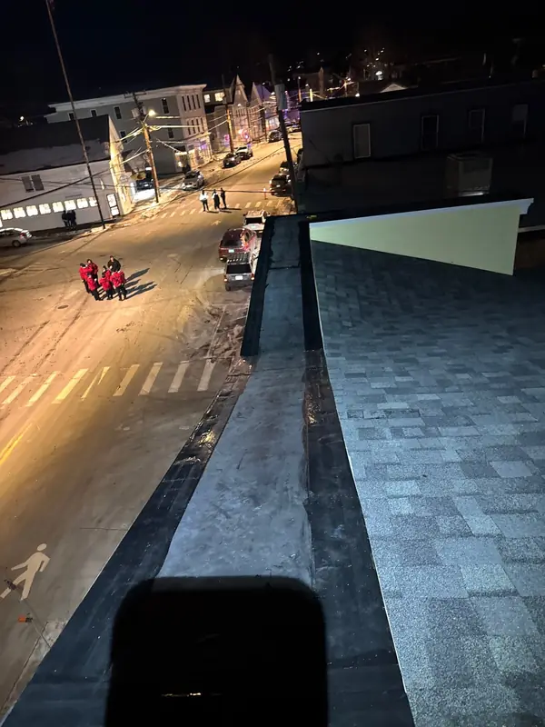 Multi-Building Reroof Staged Beside a Busy Main Street — Farmington, NH — completed by Compass Exteriors in Farmington