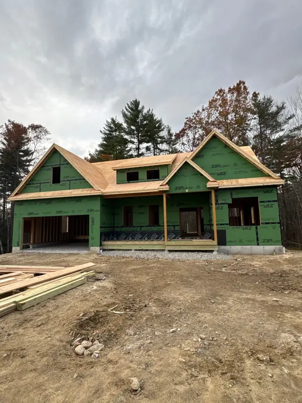 New Build Roof Blends Shingles with Metal Accents — Auburn, NH — completed by Compass Exteriors in Auburn