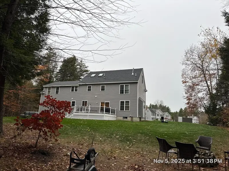 Onyx Black Shingles with Two New Velux Skylights — Brentwood, NH — completed by Compass Exteriors in Brentwood